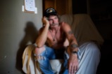 Doug Harding takes a break from cleaning out his living room as he gets ready to abandon his apartment and return to camping on the outskirts of Ogden on Aug. 29, 2016. "Society didn't give up on me," Harding said. "I gave up on them." After seven months in housing, Harding was broken down by what he saw as his homeless friends taking advantage of him and his apartment.