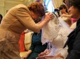 Jettie Schochet blesses her granddaughter, Chaya Zippel, during the badeken, or veiling ceremony, before she marries Rabbi Mendy Cohen in a traditional Chabad Lubavitch Jewish wedding at the Grand America Hotel in Salt Lake City on Monday, Sept. 12, 2016. The bride wears an opaque veil to emphasize marrying for inner beauty. It is the first traditional Hasidic Jewish wedding in the state of Utah.