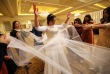 Chaya Zippel dances with female guests after marrying Rabbi Mendy Cohen in a traditional Chassidic wedding at the Grand America Hotel in Salt Lake City on Monday, Sept. 12, 2016. The men and women celebrate in different areas and the bride and groom never dance together.