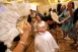 Female guests fan Chaya Zippel during her and Rabbi Mendy Cohen's traditional Chabad Lubavitch Jewish wedding at the Grand America Hotel in Salt Lake City on Monday, Sept. 12, 2016. Men and women celebrate separately.